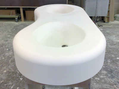 Curved double sink